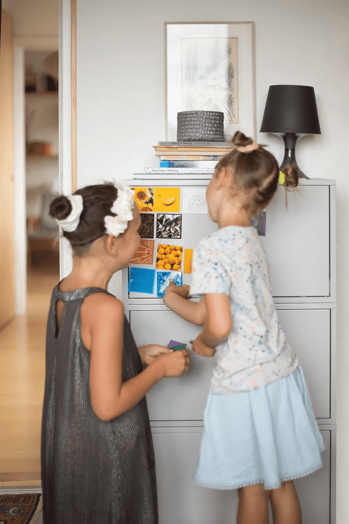 Kids playing with magnetic stickers